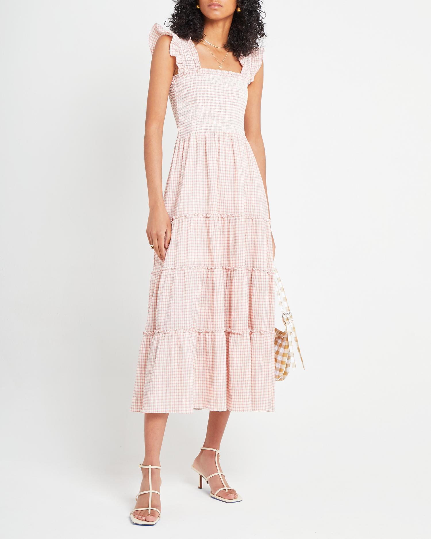 First image of Calypso Maxi Dress, a pink maxi dress, ruffle cap sleeves, smocked bodice