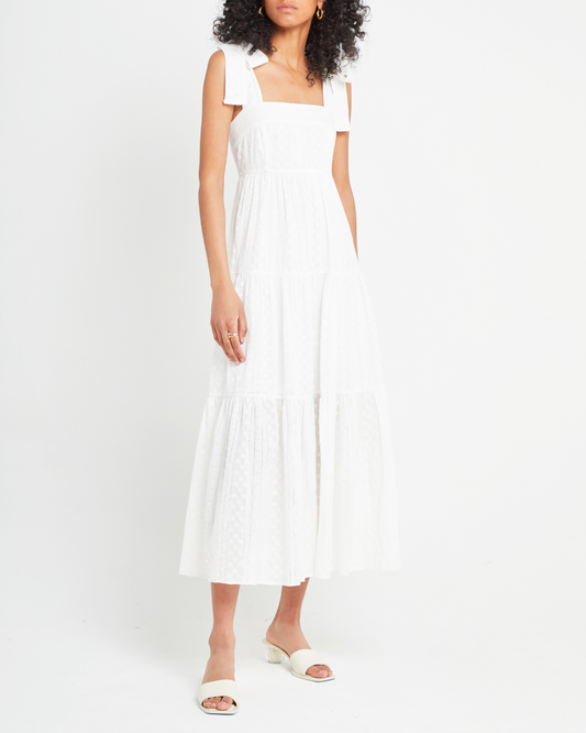 First image of Cotton Artemis Dress, a white midi dress, lace material, eyelet, tie straps, ribbon, tank