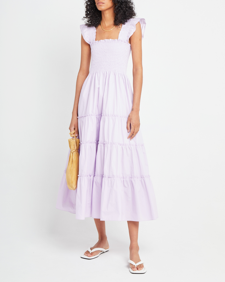 First image of Calypso Maxi Dress, a purple maxi dress, ruffle cap sleeves, smocked bodice