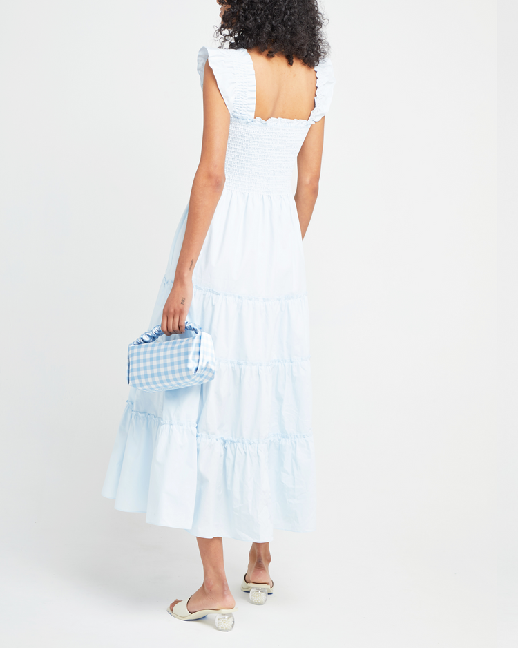 Second image of Calypso Maxi Dress, a blue maxi dress, ruffle cap sleeves, smocked bodice