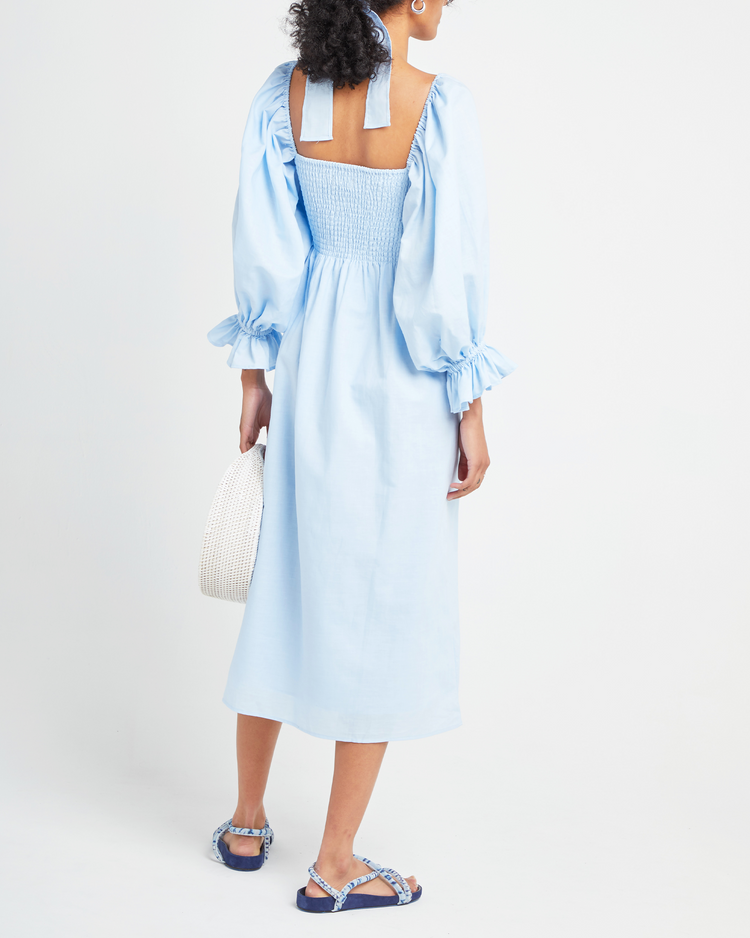 Third image of Athena Dress, a blue midi dress, off shoulder, long sleeve, puff sleeves, smocked