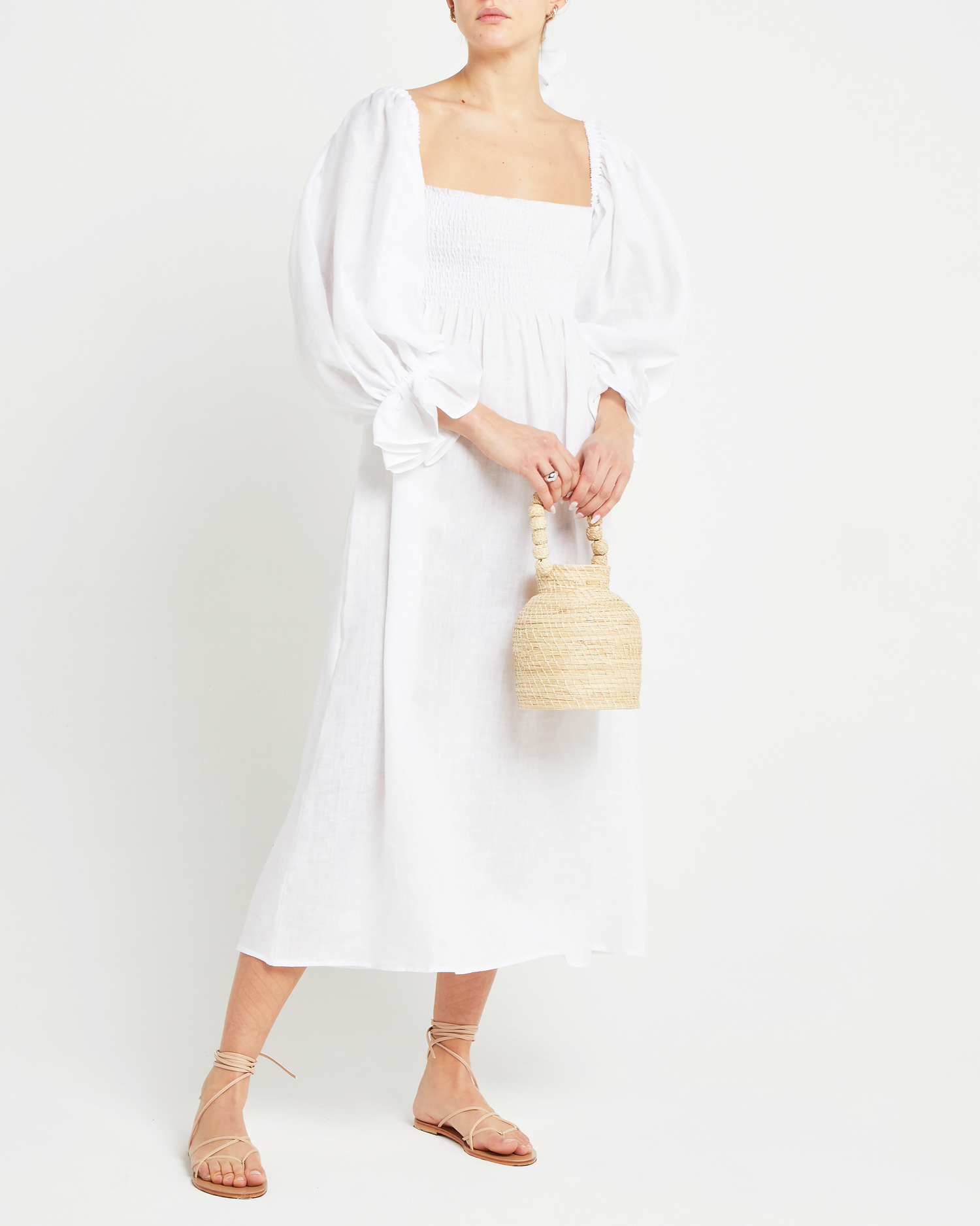 Fourth image of Athena Dress, a white midi dress, off shoulder, long sleeve, puff sleeves, smocked