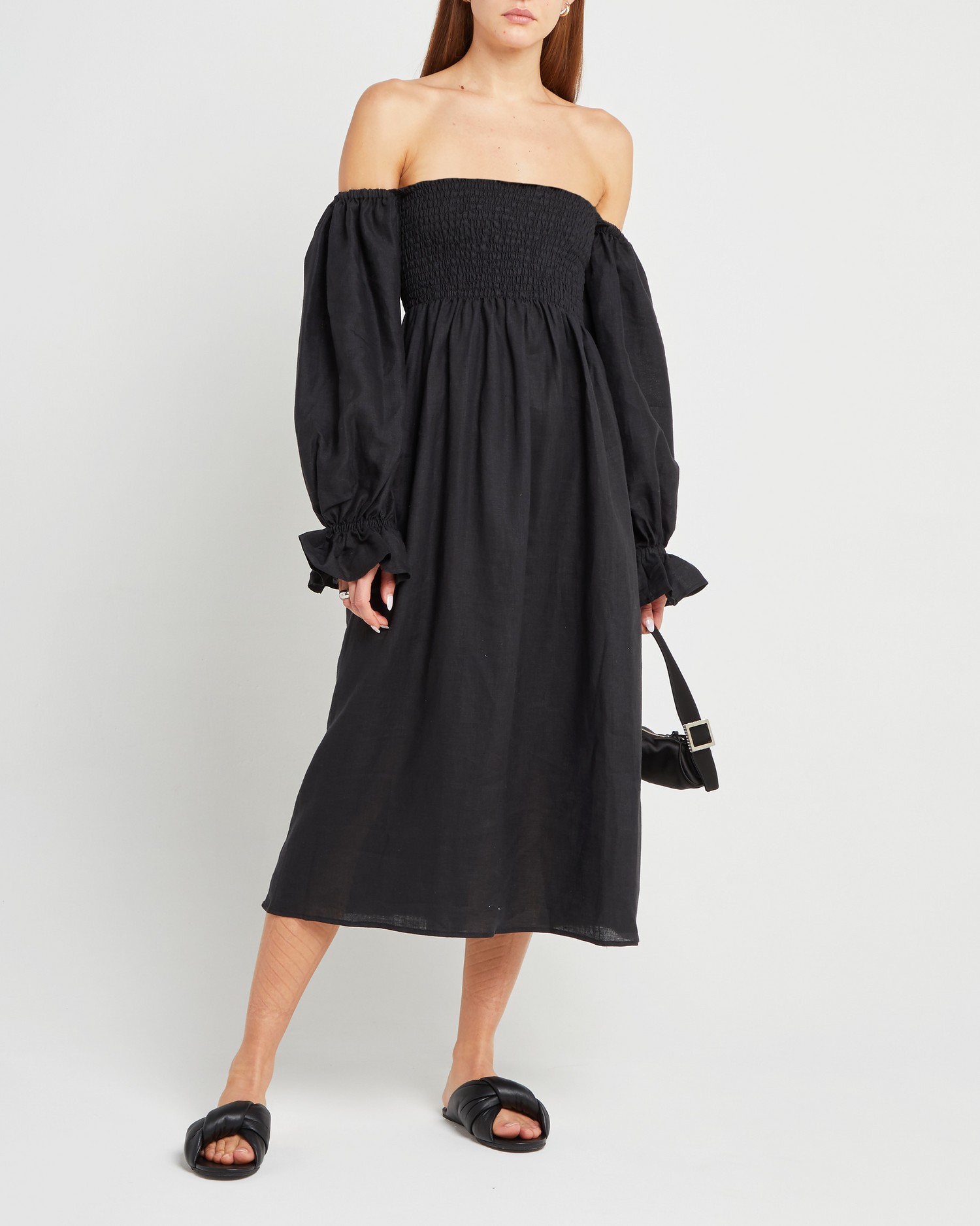 Fourth image of Athena Dress, a black midi dress, off shoulder, long sleeve, puff sleeves, smocked