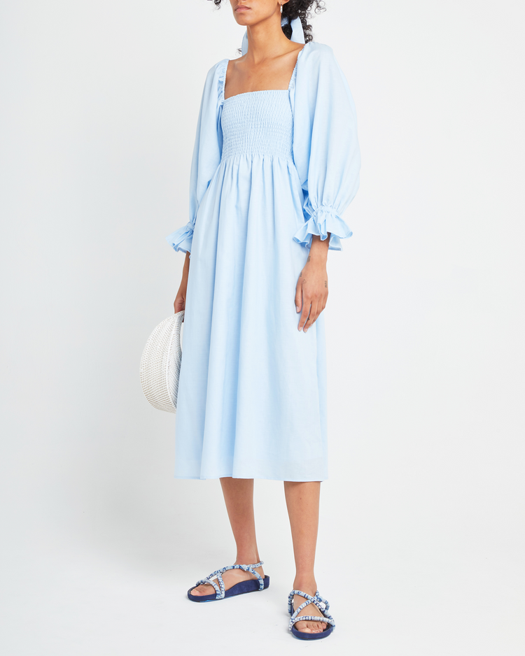 Sixth image of Athena Dress, a blue midi dress, off shoulder, long sleeve, puff sleeves, smocked