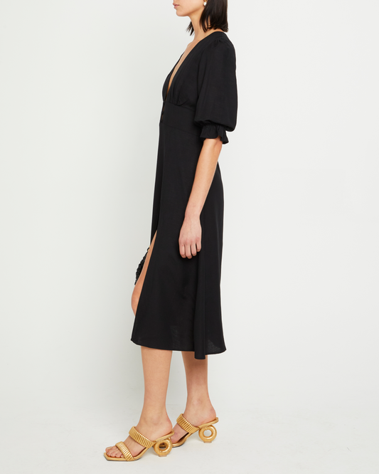 Third image of Julien Dress, a black maxi dress, button up, side slit, 3/4 sleeves, V-neck, plung neck, puff sleeves