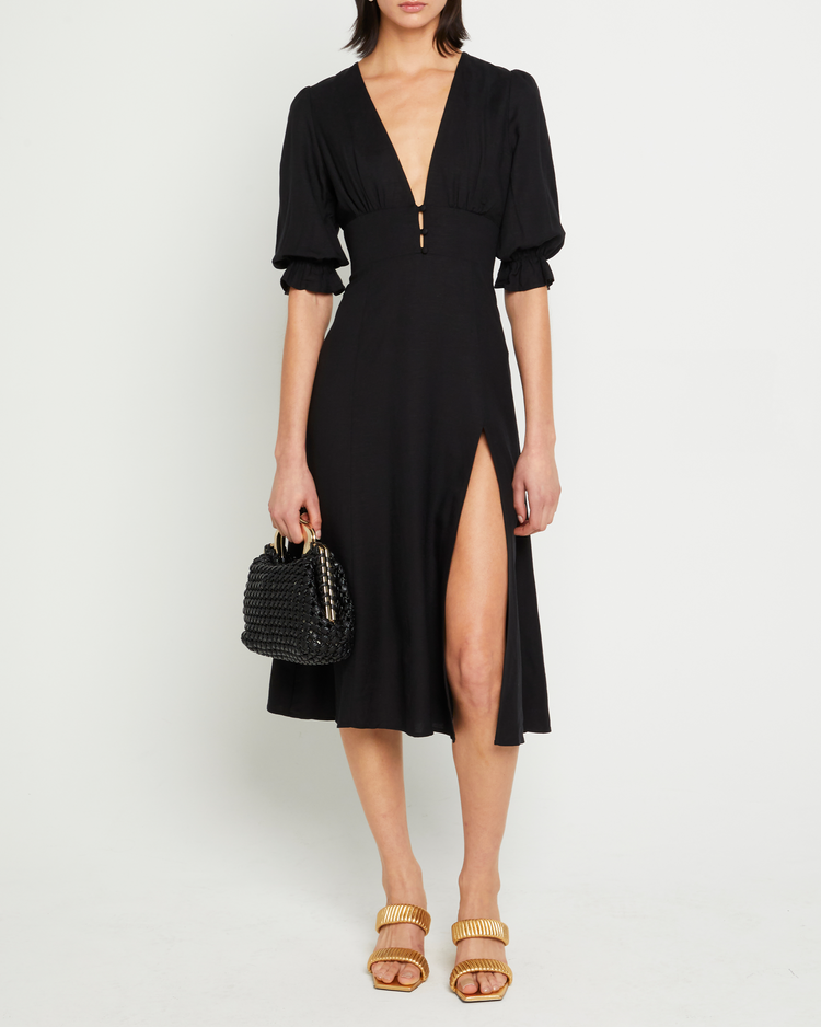 Fourth image of Julien Dress, a black maxi dress, button up, side slit, 3/4 sleeves, V-neck, plung neck, puff sleeves