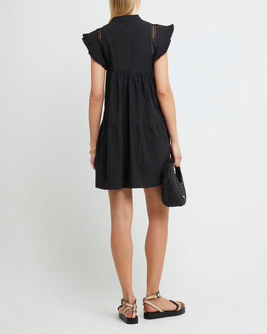 Second image of Callan Dress, a black mini dress, paneled, lace, ruffle sleeve, high neckline