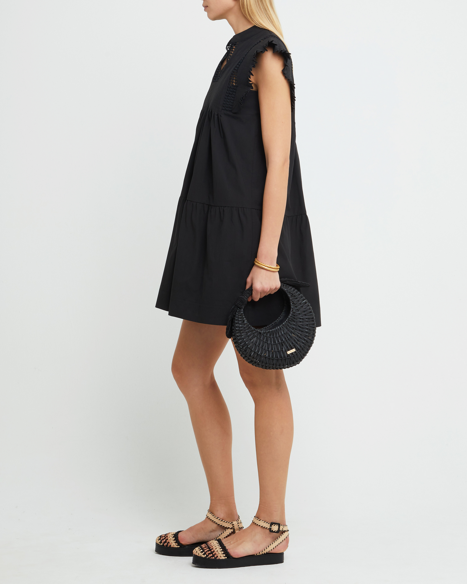 Third image of Callan Dress, a black mini dress, paneled, lace, ruffle sleeve, high neckline