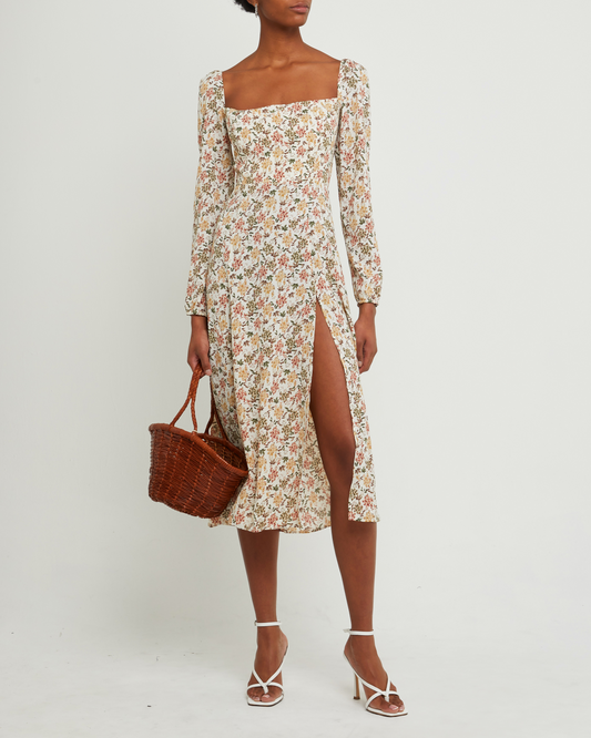 First image of Lenon Dress, a green midi dress, side skirt slit, long sleeves, square neckline