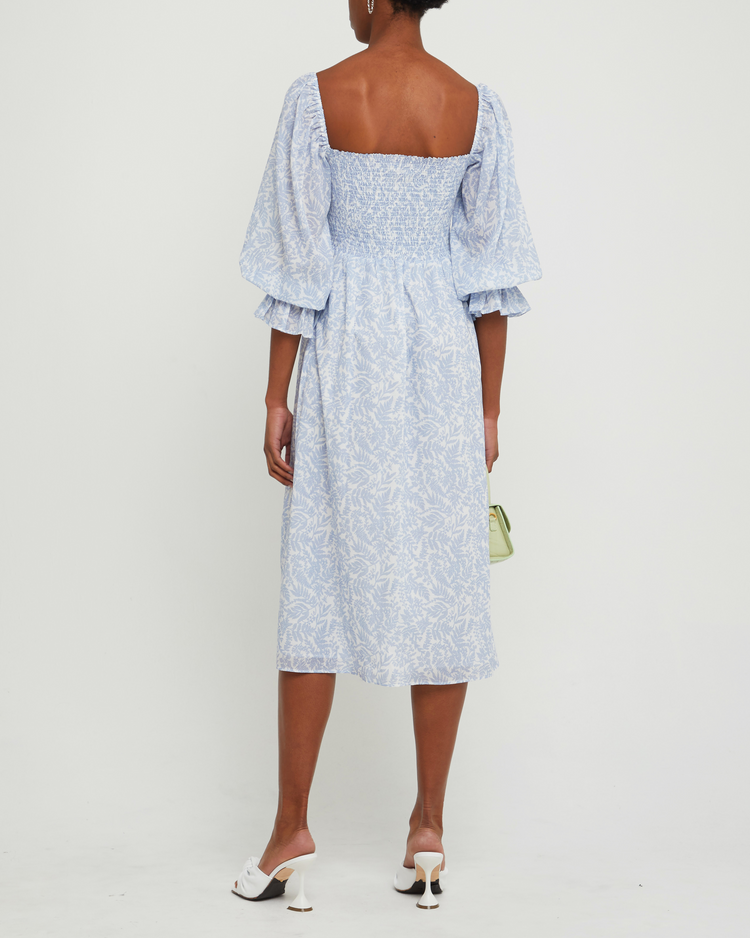 Second image of Sofija Dress, a blue midi dress, side slit, square neckine, smocked, puff sleeves