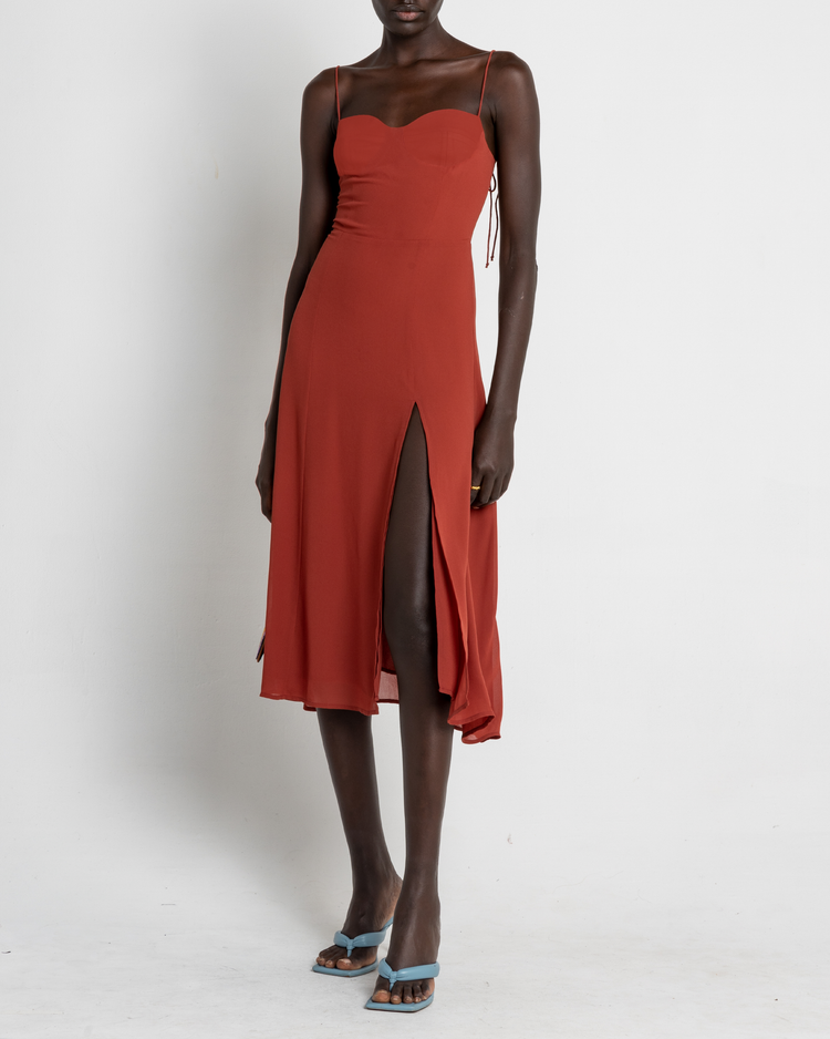 Fifth image of Venus Dress, a orange midi dress, tie straps, spaghetti straps, side slit, bodice